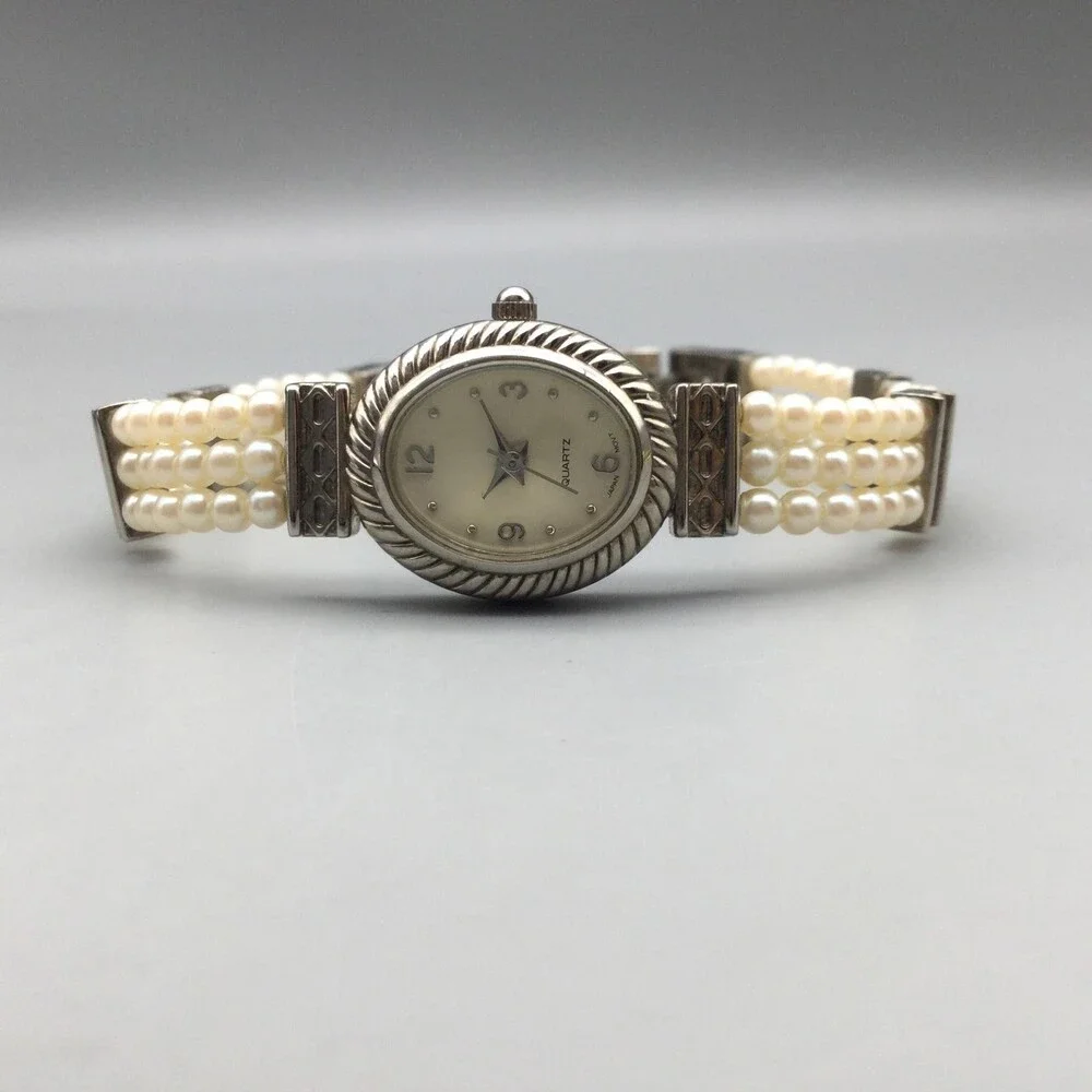 Avon Womens Watch 18mm Cream Oval Dial Faux Pearl Bracelet New Battery
